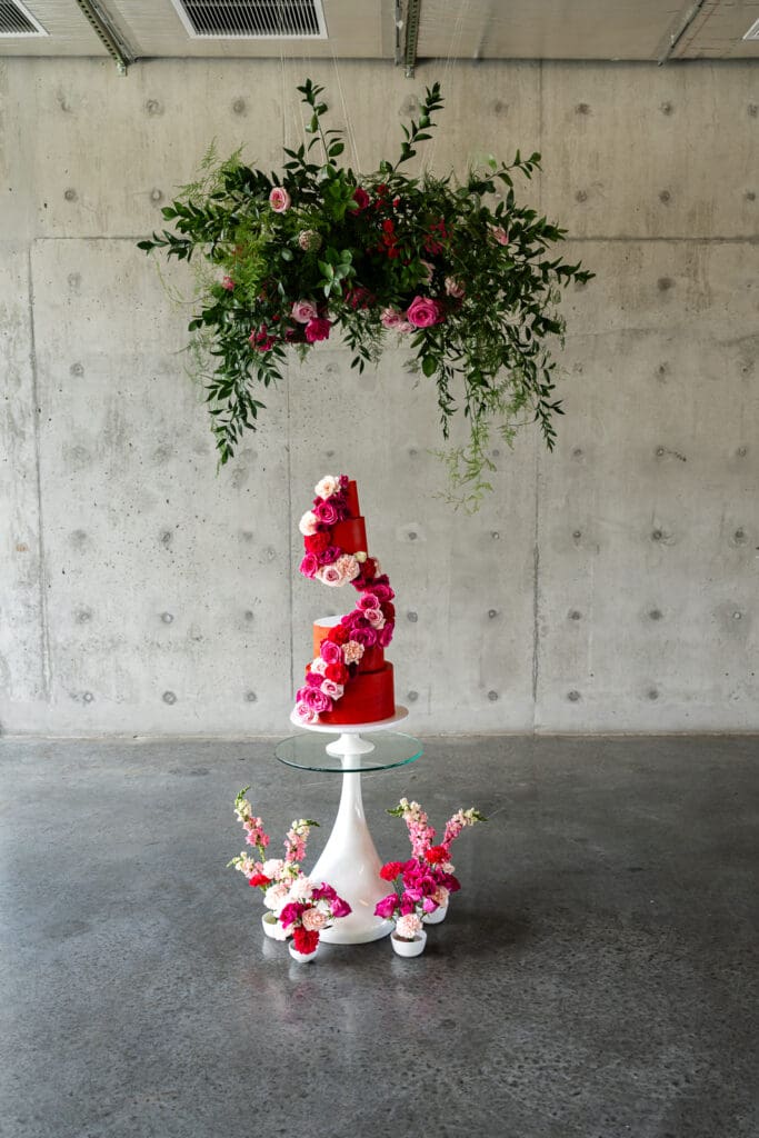 Red tiered wedding cake with florals Portland wedding styled shoot